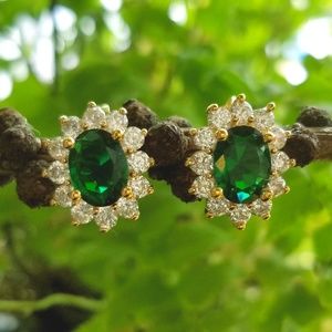 Gold emerald starburst stud earrings
